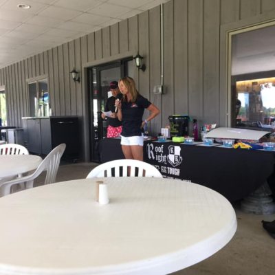 Tammy Lofink of Rising Above Addiction participates in the Sickle Drive Annual Invitational Golf Tournament